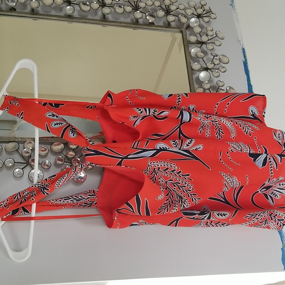 Orange floral blouse
